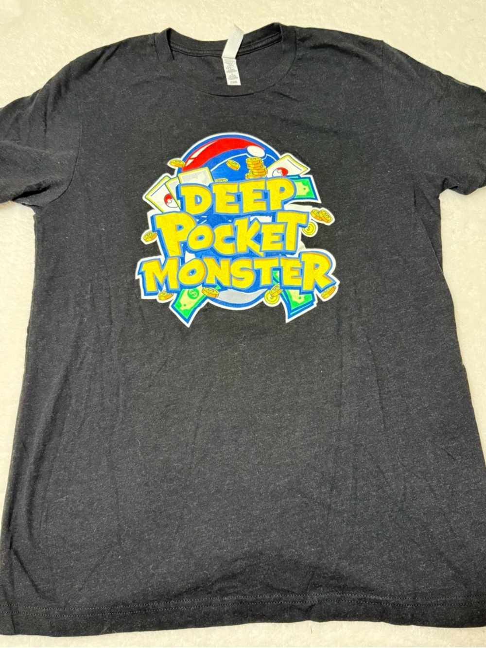 Bella Canvas Black Tee with Yellow "Deep Pocket Monster" Graphic